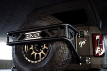 Load image into Gallery viewer, DV8 Offroad 21-23 Ford Bronco Spare Tire Guard & Accessory Mount