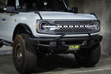 Load image into Gallery viewer, DV8 Offroad 21-22 Ford Bronco Factory Front Bumper License Relocation Bracket - Front