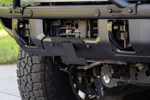Load image into Gallery viewer, DV8 Offroad 21-22 Ford Bronco Factory Front Bumper License Relocation Bracket - Front