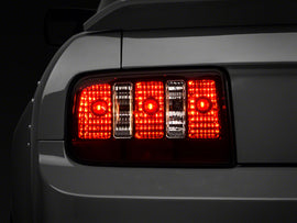 Raxiom 05-09 Ford Mustang Coyote Tail Lights- Black Housing (Smoked Lens)