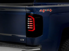 Load image into Gallery viewer, Raxiom 14-18 Chevrolet Silverado 1500 Axial Series LED Tail Lights- Black Housing (Smoked Lens)