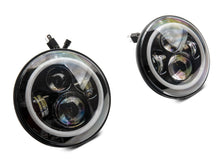 Load image into Gallery viewer, Raxiom 97-18 Jeep Wrangler TJ/JK Axial 7-Inch LED Headlights w/RGB Halo- Black Housing (Clear Lens)