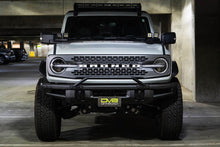 Load image into Gallery viewer, DV8 Offroad 21-22 Ford Bronco Factory Front Bumper License Relocation Bracket - Front