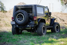Load image into Gallery viewer, DV8 Offroad 07-18 Jeep Wrangler (JK) Tire Carrier for MTO Bumper