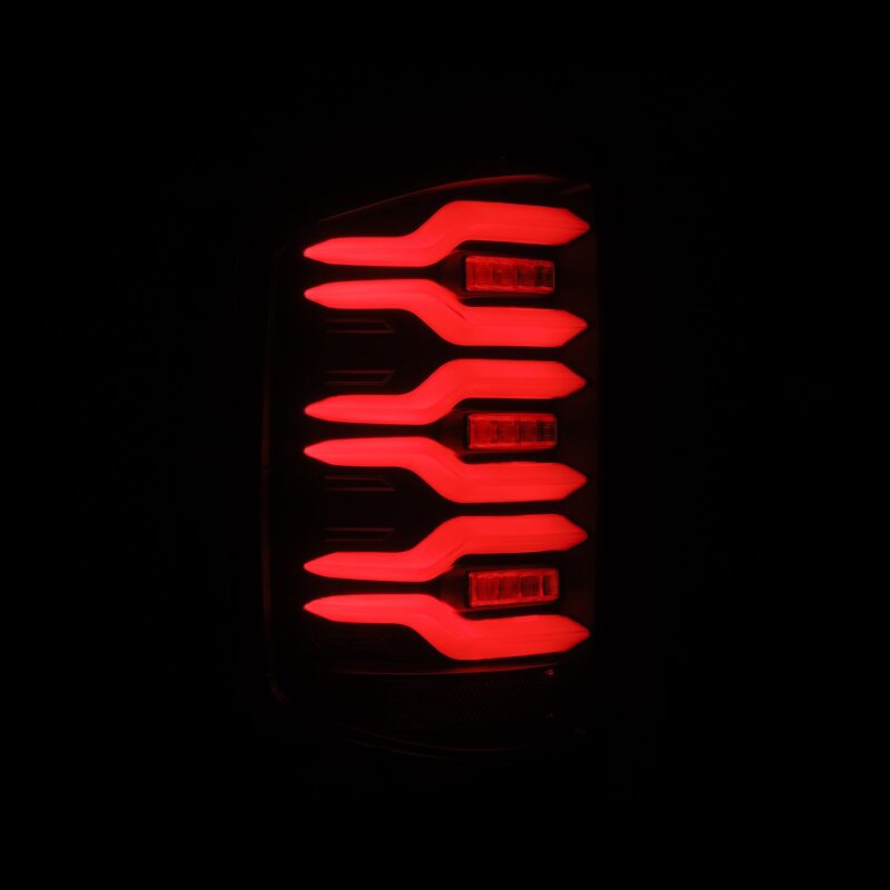AlphaRex 14-18 Chevrolet Silverado Luxx-Series LED Tail Lights Black w/Activ Light/Seq Signal