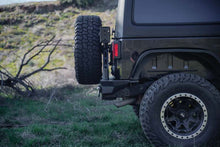 Load image into Gallery viewer, DV8 Offroad 07-18 Jeep Wrangler (JK) Tire Carrier for MTO Bumper