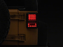 Load image into Gallery viewer, Raxiom 07-18 Jeep Wrangler JK Axial Series Lux LED Tail Lights- Black Housing (Clear Lens)
