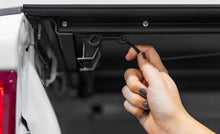 Load image into Gallery viewer, Access LOMAX Tri-Fold Cover 22-26 Toyota Tundra 5Ft./6in. Bed w/ deck rail - Matte Black