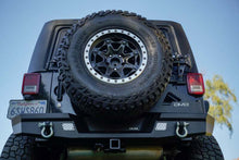 Load image into Gallery viewer, DV8 Offroad 07-18 Jeep Wrangler (JK) Tire Carrier for MTO Bumper