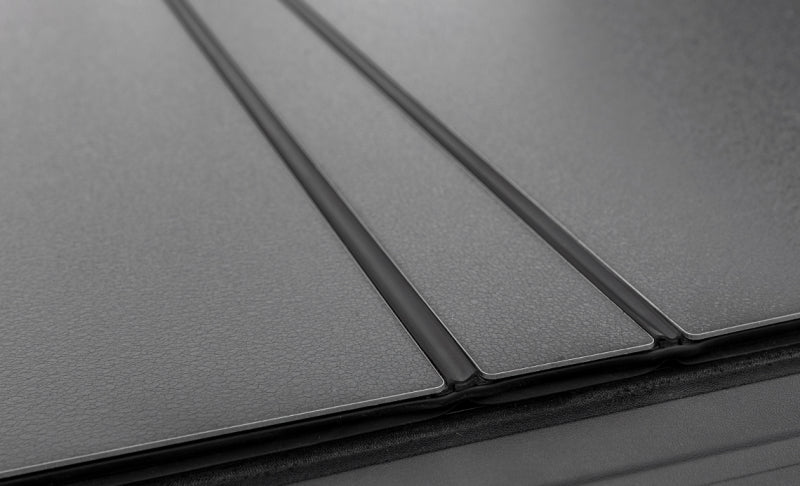 Access LOMAX Tri-Fold Cover 22-26 Toyota Tundra 5Ft./6in. Bed w/ deck rail - Matte Black