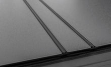 Load image into Gallery viewer, Access LOMAX Tri-Fold Cover 22-26 Toyota Tundra 5Ft./6in. Bed w/ deck rail - Matte Black
