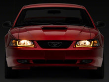 Load image into Gallery viewer, Raxiom 99-04 Ford Mustang Axial Series Headlights w/ Sequential LED Bar- Black Housing (Clear Lens)