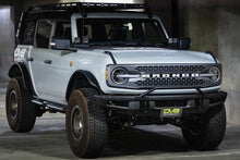 Load image into Gallery viewer, DV8 Offroad 21-22 Ford Bronco Factory Front Bumper License Relocation Bracket - Front
